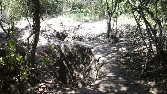 Una de las fosas encontradas en México